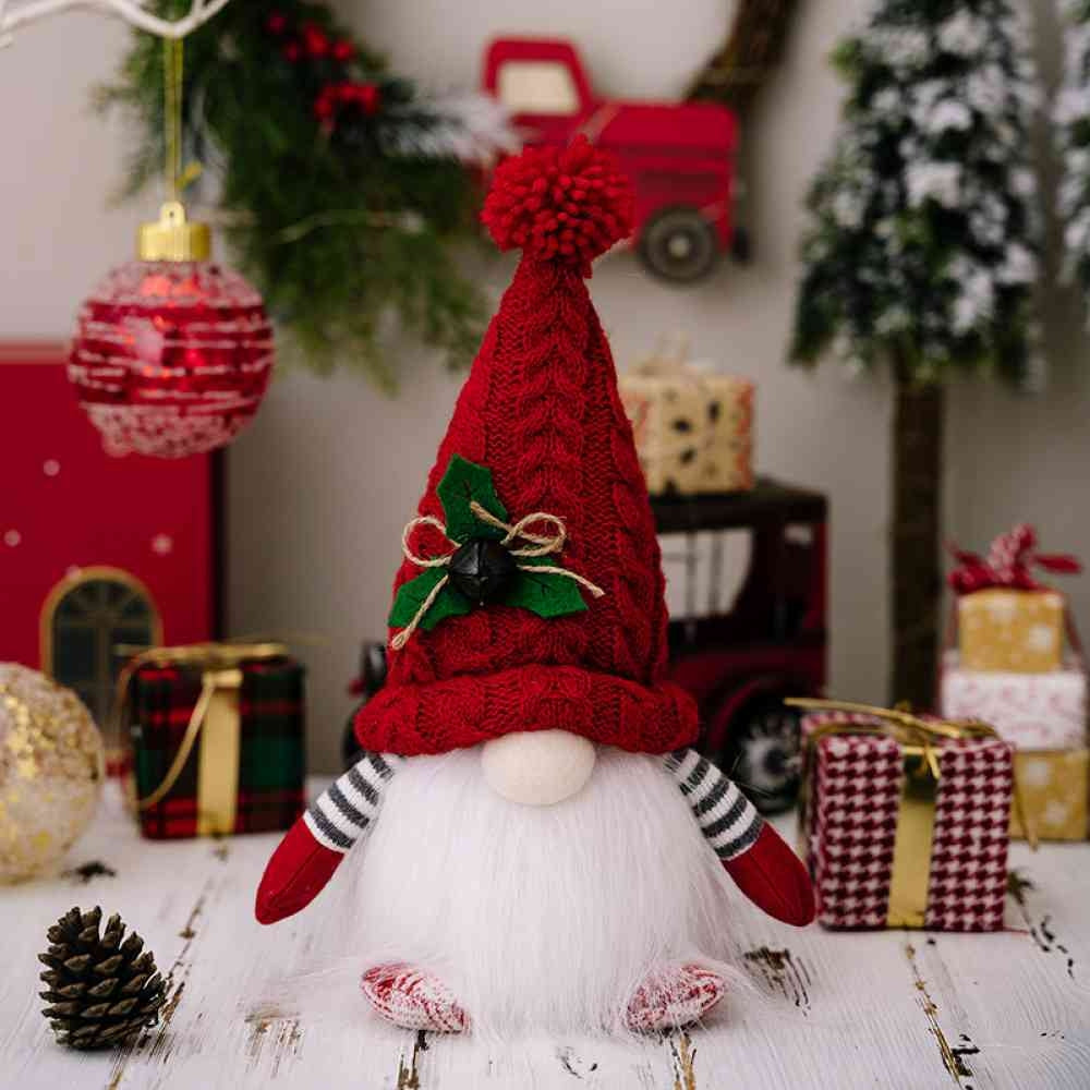 Light-up Christmas gnome with a red knit hat in a holiday scene