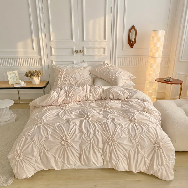 Ruffle floral duvet cover set with pinch-pleat texture on a bed