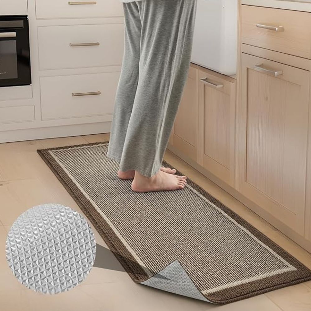 Standing barefoot on the Strata kitchen rug, anti-slip backing shown