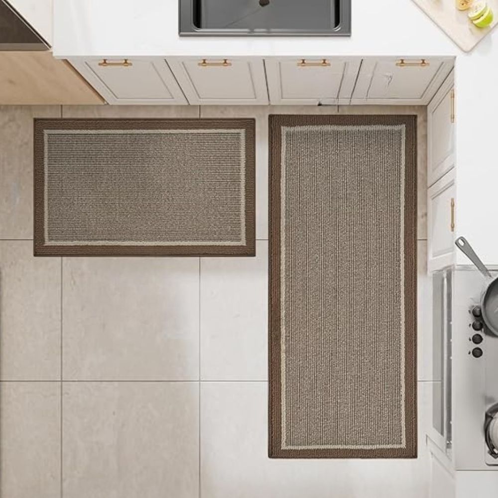 Two Strata kitchen rugs on a kitchen floor seen from above