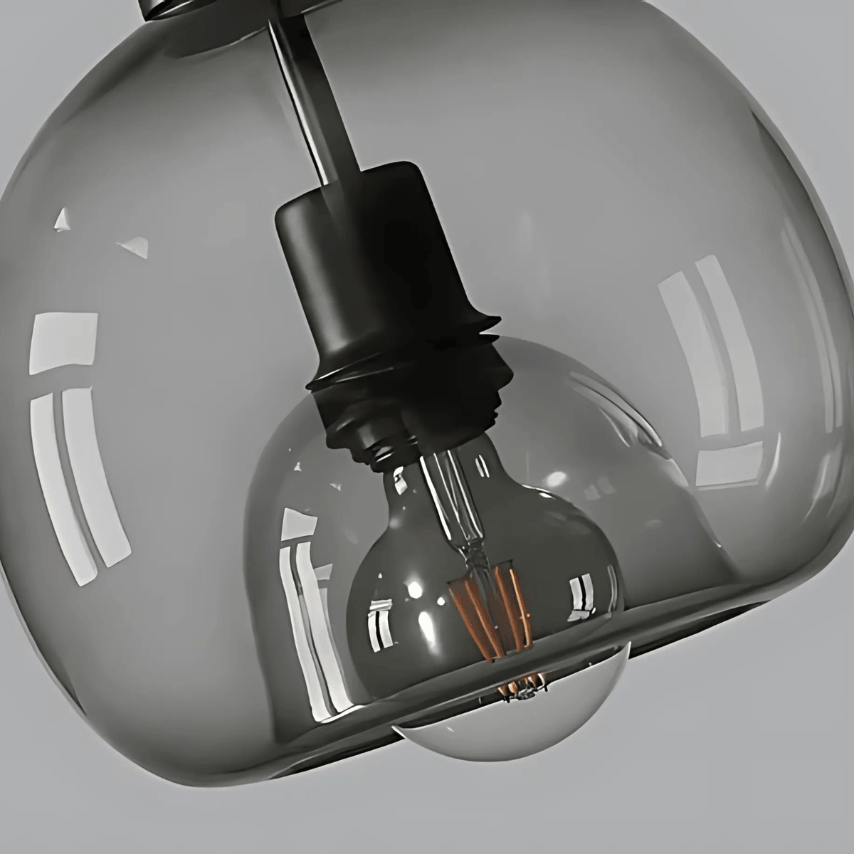 Close view of the smoke gray Clyde glass shade and bulb