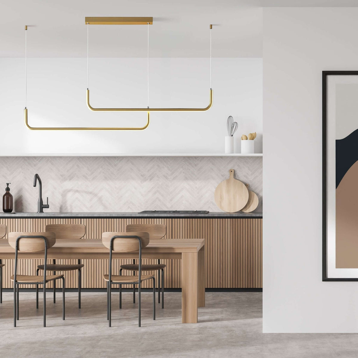 Gold Dumont linear pendant light over a wooden dining table