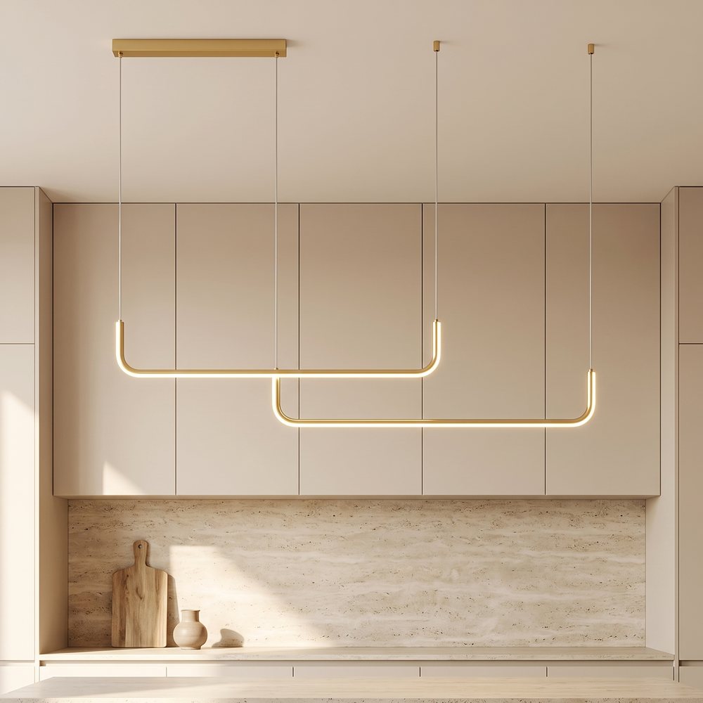 Gold two bar Dumont linear pendant light in a warm beige kitchen