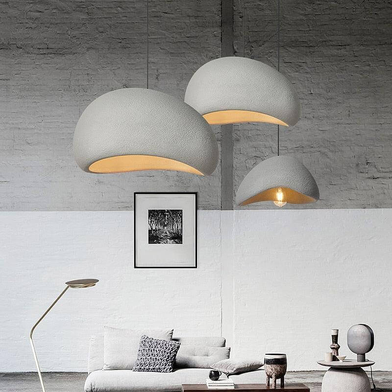 Three gray Ginza pendant lights in a loft living room