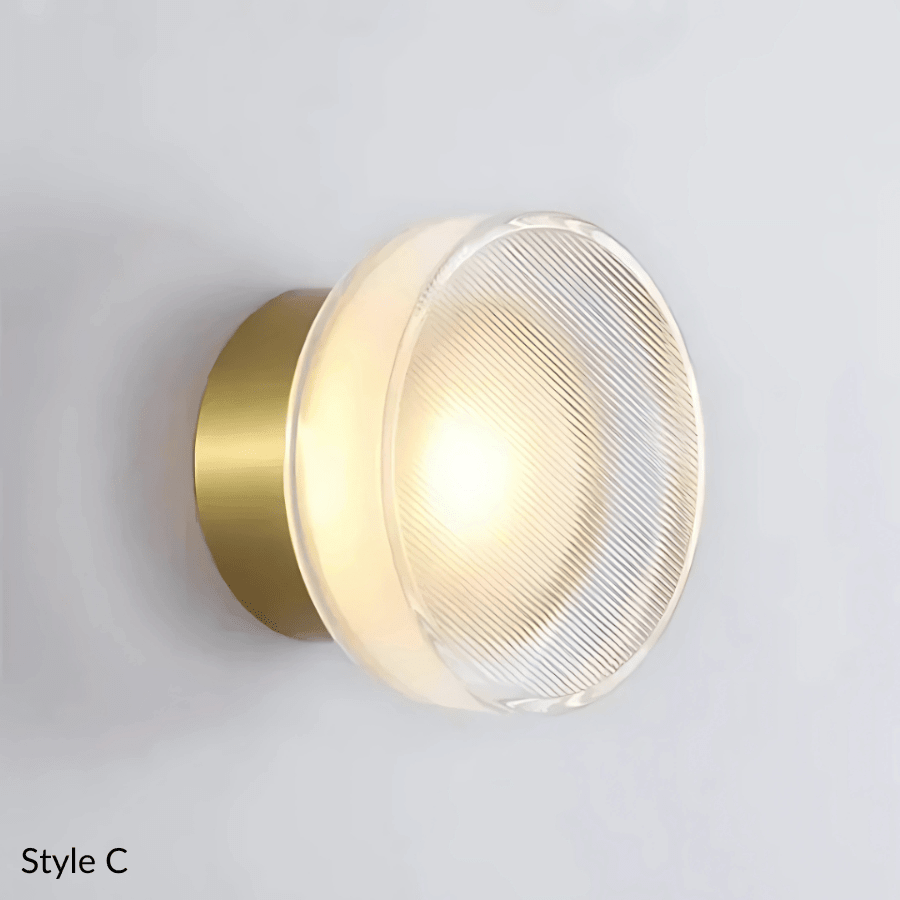 Hera wall sconce Style C with gold base and prismatic glass shade