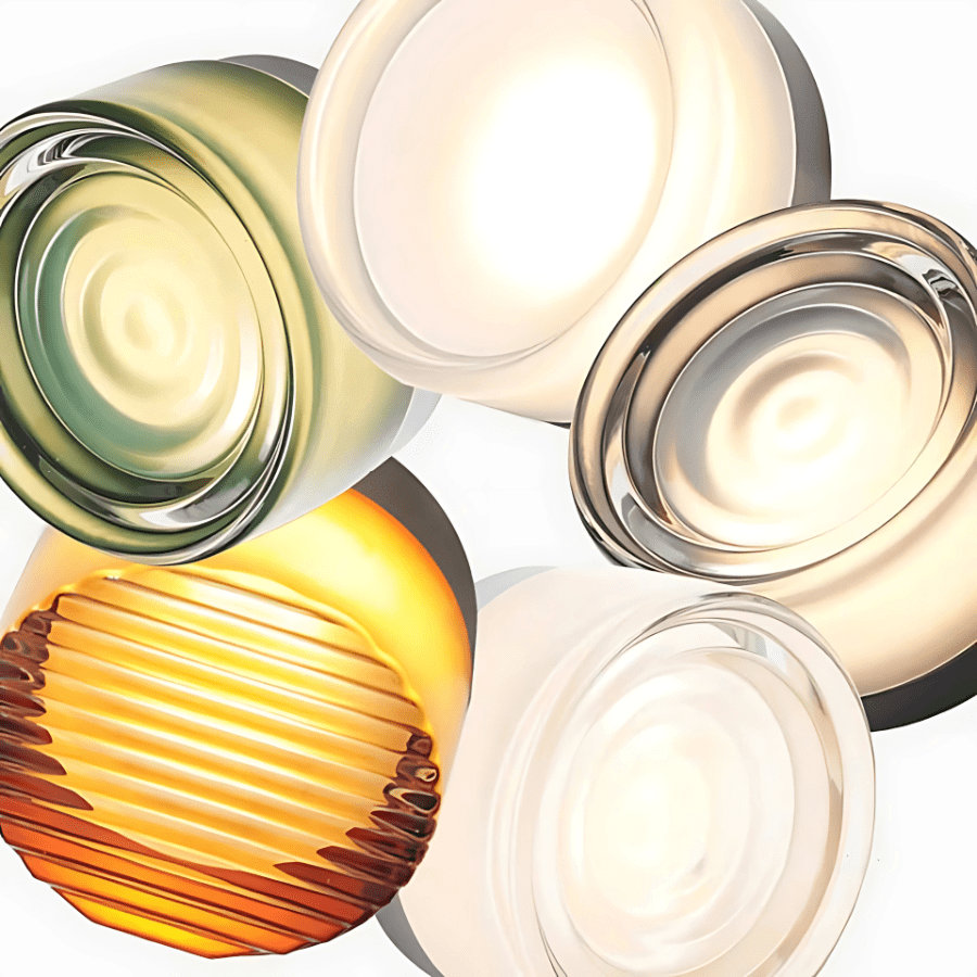 Close view of Hera wall sconce glass shades in several colors