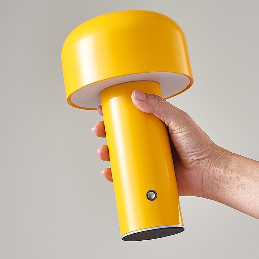 Retro Italian mushroom portable table lamp shown in a warm evening interior