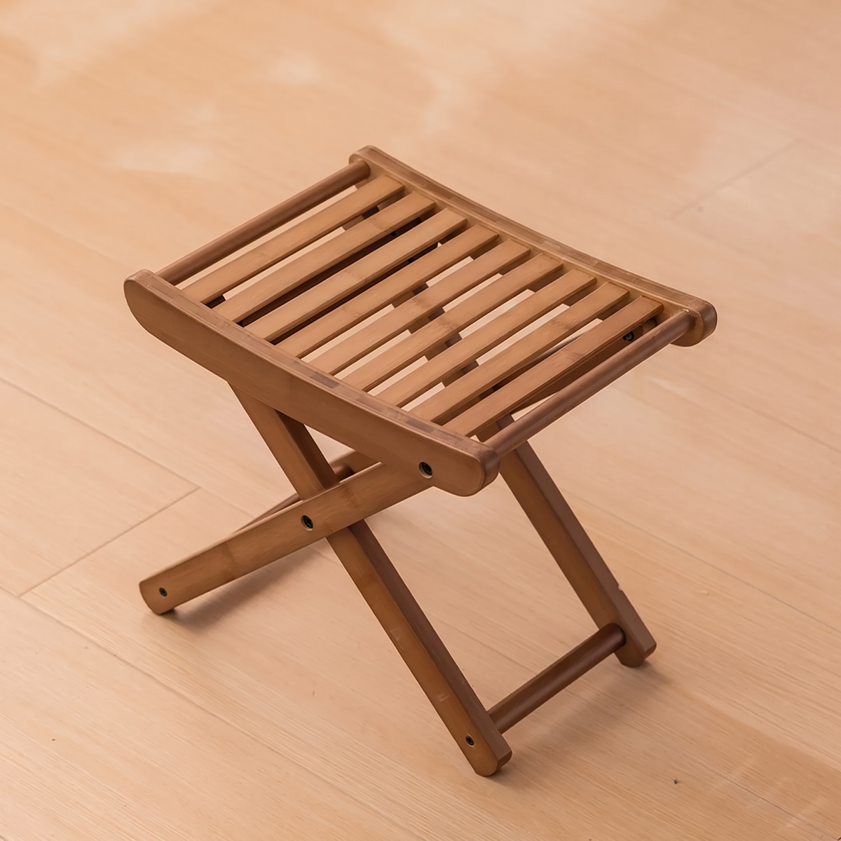 View from above of the curved slats on the bamboo folding stool