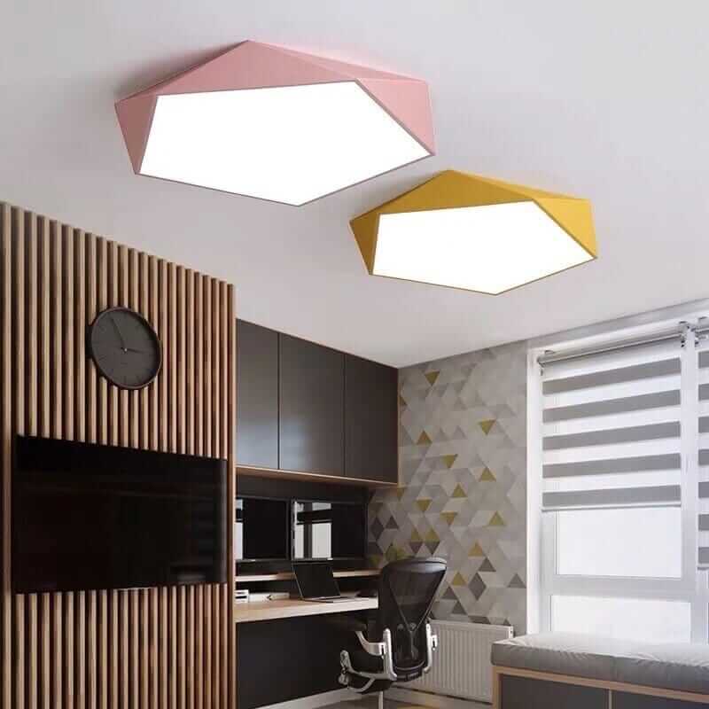 Pink and yellow Skydor ceiling lights side by side in a study