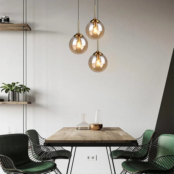 Hand-Blown Glass Globe Pendant Light Brass – Amber & Clear | Qonforta