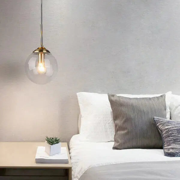 Hand-Blown Glass Globe Pendant Light Brass – Amber & Clear | Qonforta