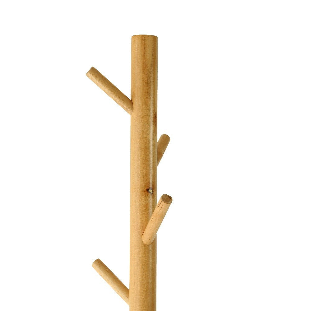 Close up of the birch stem and branch hooks of the coat rack