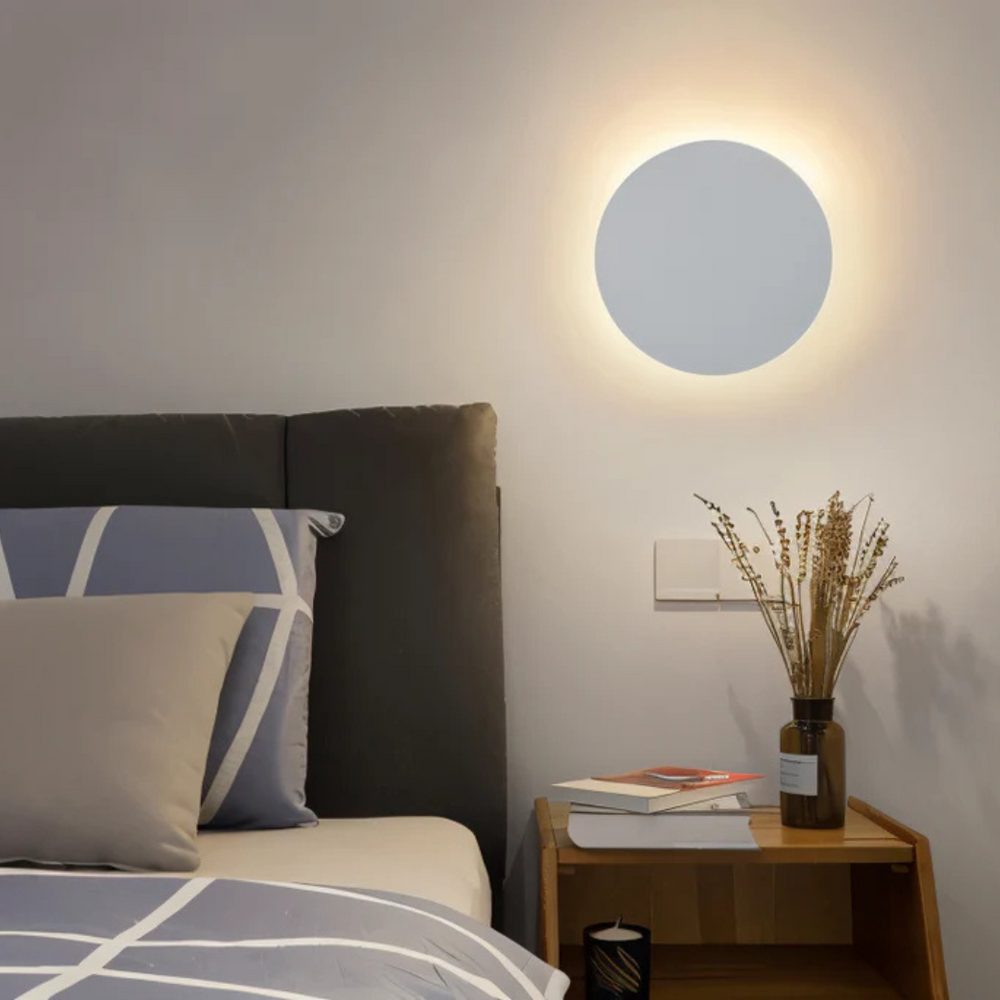 Hadro modern round LED wall light for the living room
