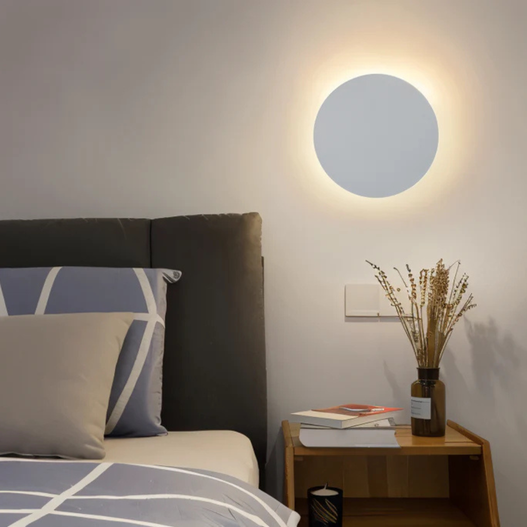 Hadro modern round LED wall light for the living room