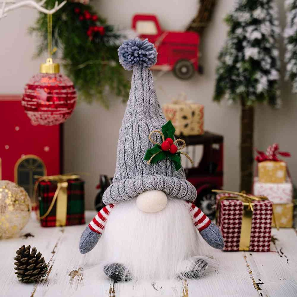Light-up Christmas gnome with a gray knit hat in a holiday scene