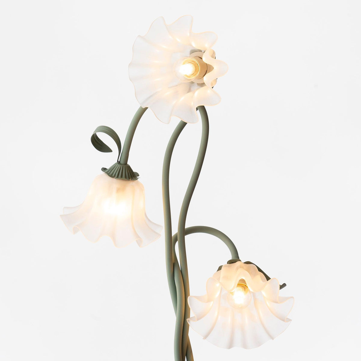 Calla lily floor lamp, green stem white shades - mounting hardware detail, warm light