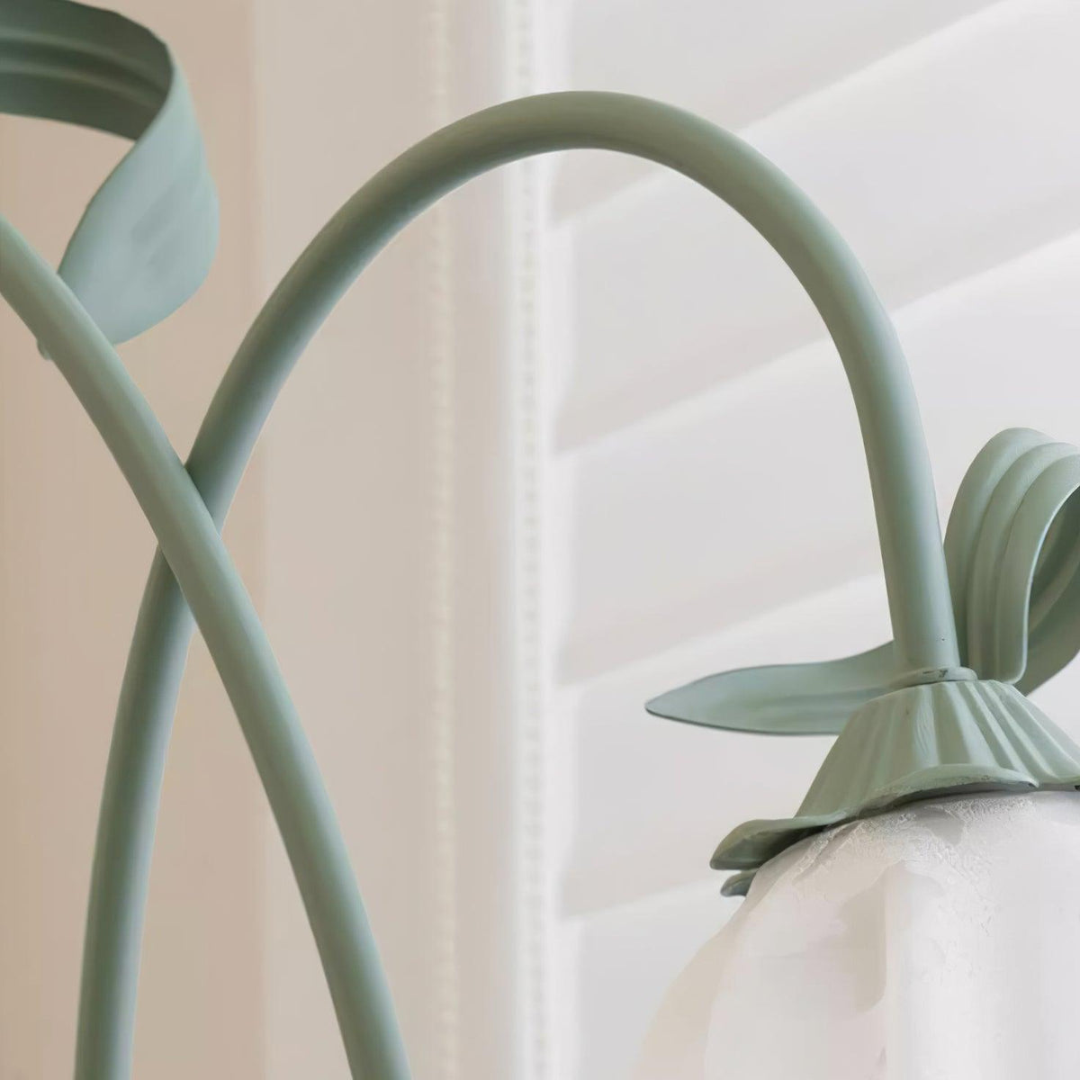 Calla lily floor lamp, green stem white shades - shown for scale, warm light
