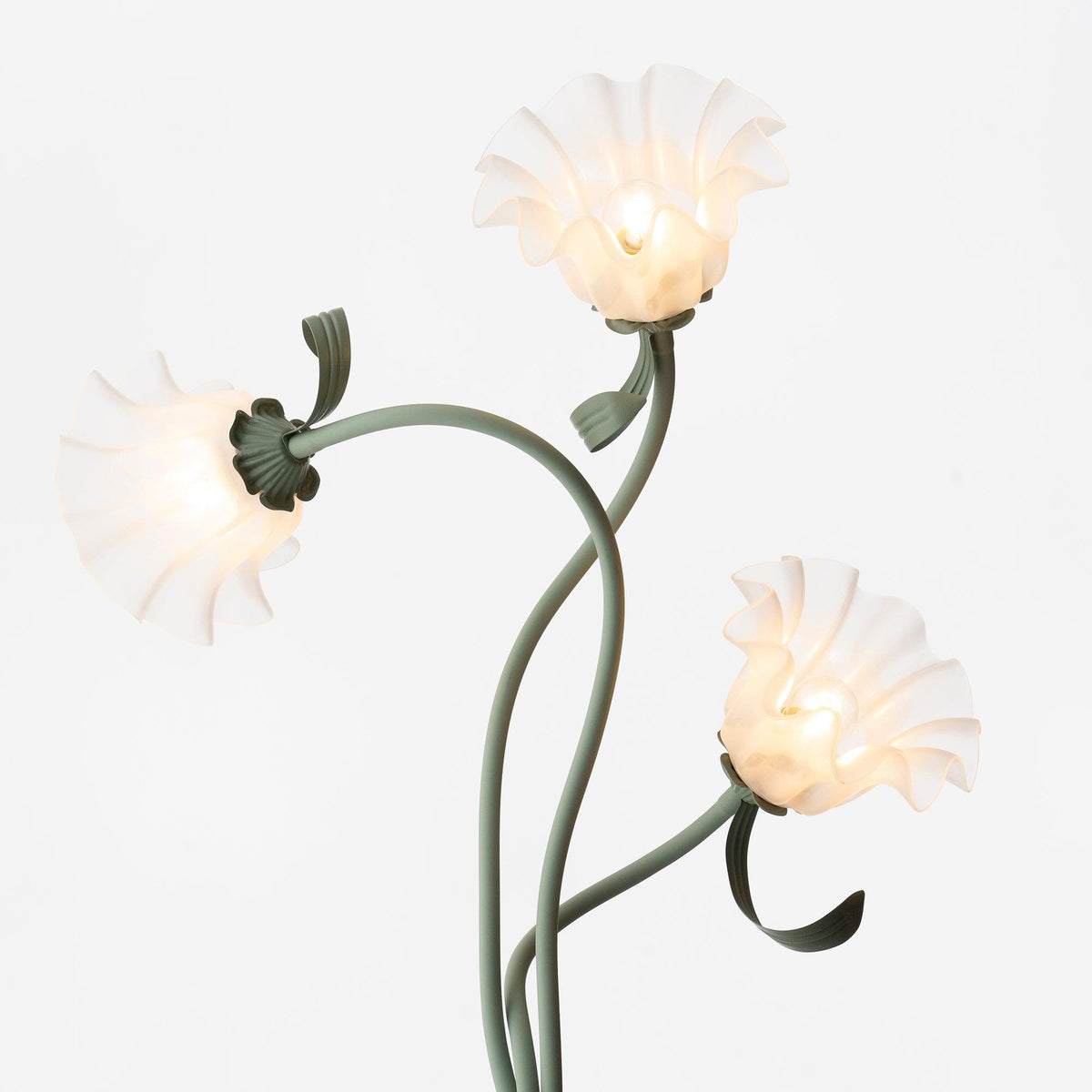 Calla lily floor lamp, green stem white shades - shade detail, warm light
