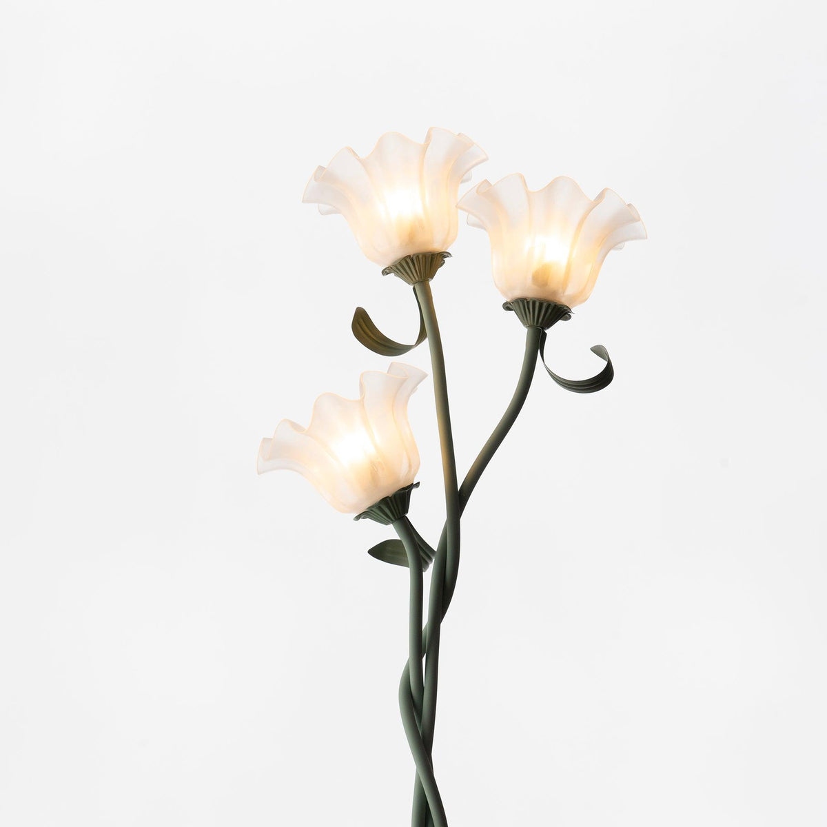 Calla lily floor lamp, green stem white shades - studio front view, warm light