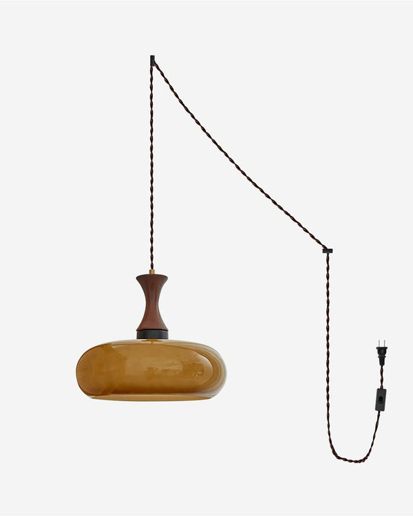 Mayon plug-in pendant light, brown glass shade - studio front view