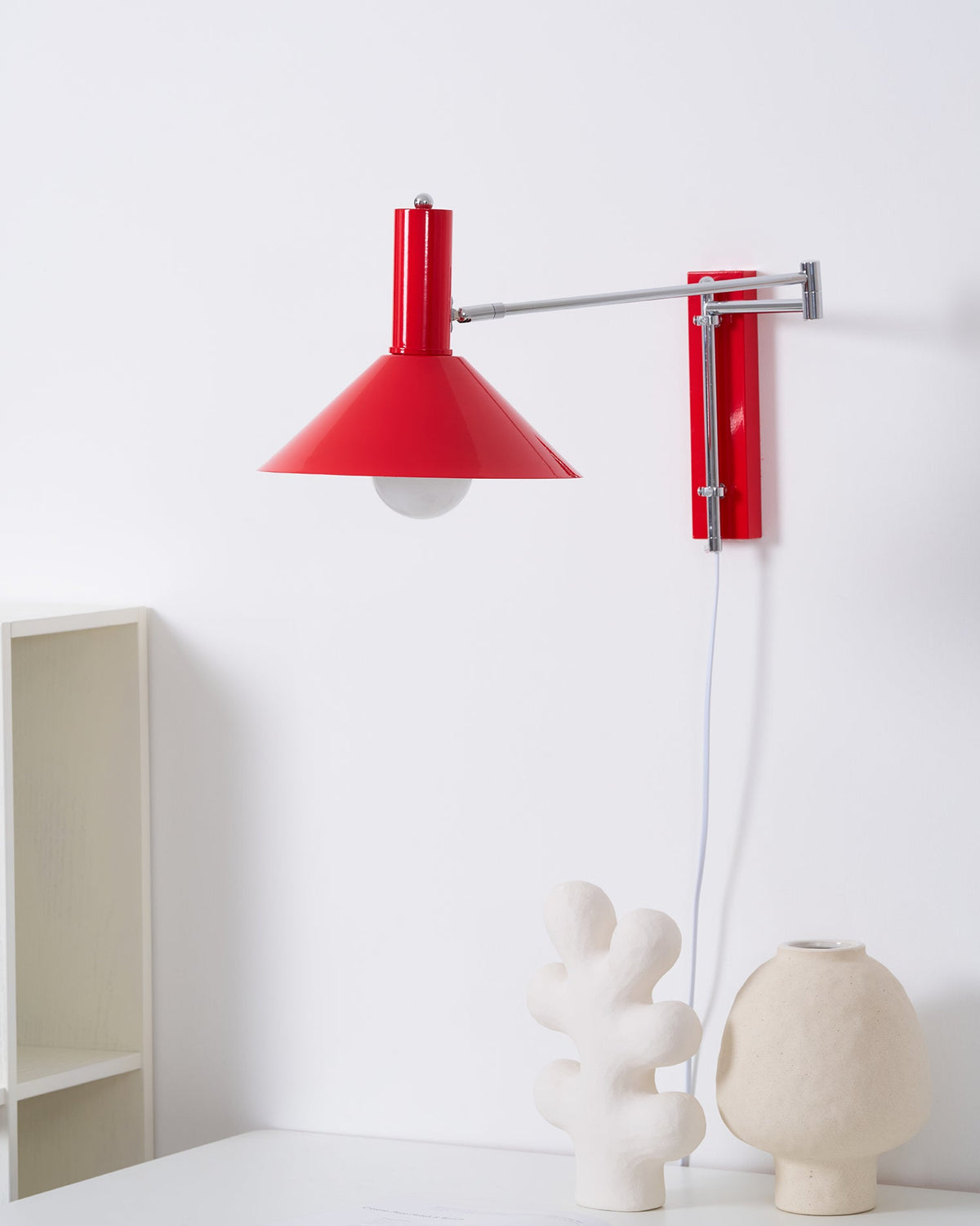 Peak plug-in wall light, swivel head - cord and switch detail, warm light