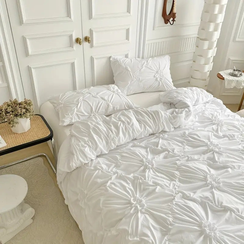 Pinch-pleat floral ruffle bedding texture detail
