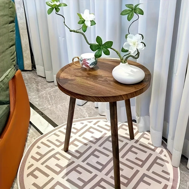 Zeraphia round table used as a small center table in a living room