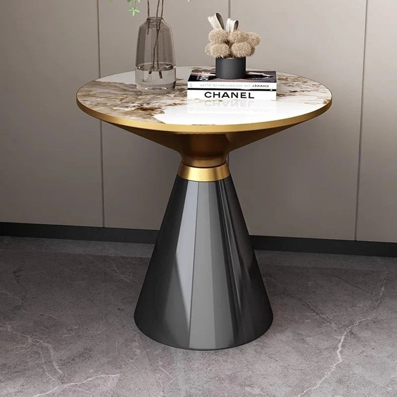 Elarian round side table shown in its black finish