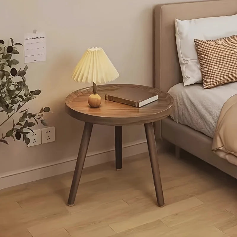 Zeraphia round brown wood side table with a minimalist profile