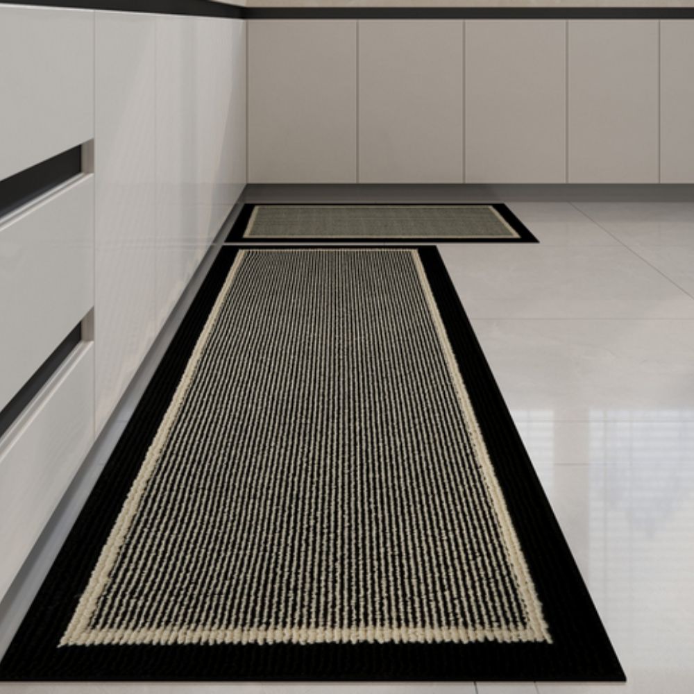 Strata washable kitchen rug in Midnight in a white kitchen