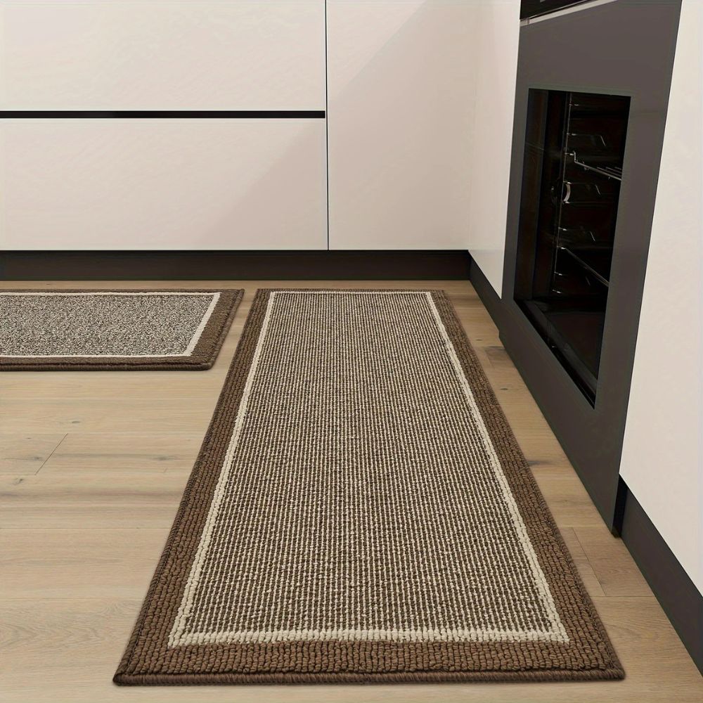 Strata kitchen rug in Mocha on a wood floor by the oven