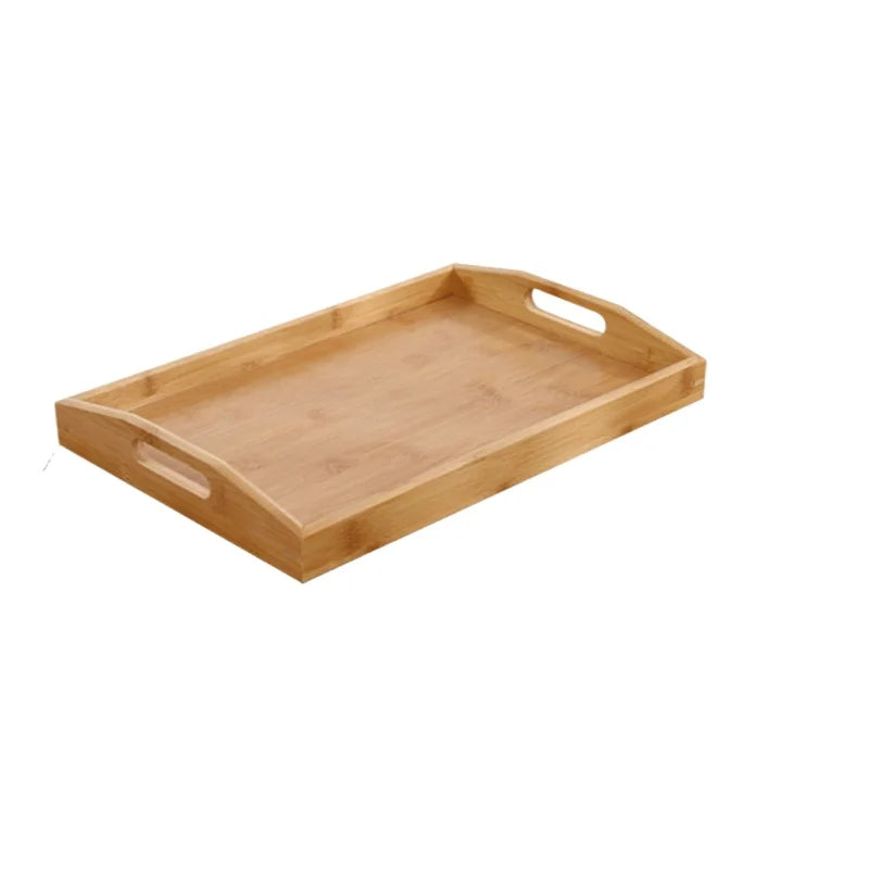 Curved bamboo tray with rising ends and cut out handles on white