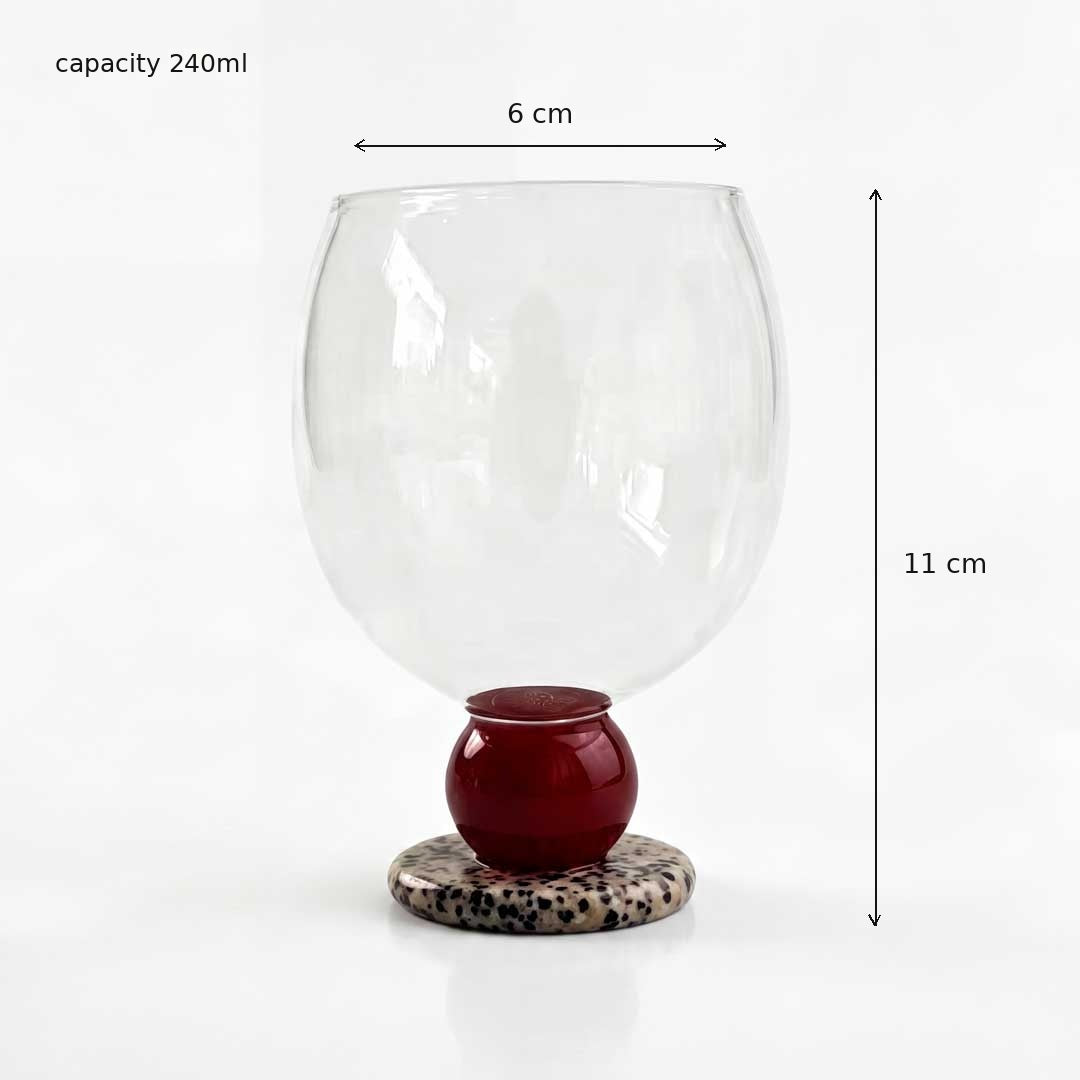 Stone base drinking glass with its height and width marked