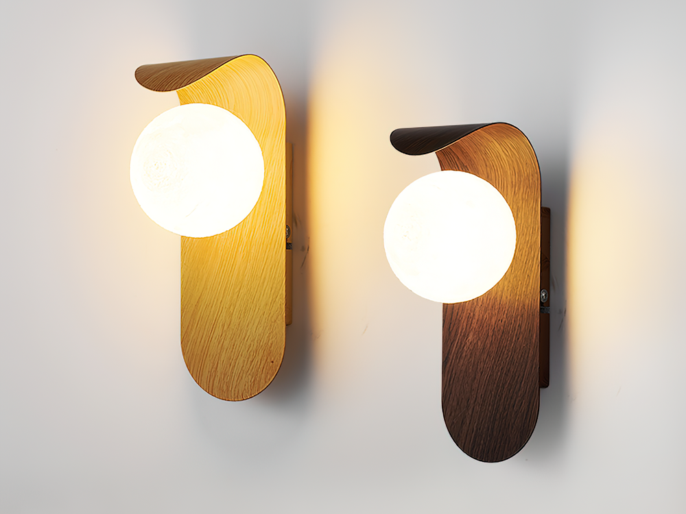 Two Carlyle wall lamps side by side, wood color and walnut color, both switched on