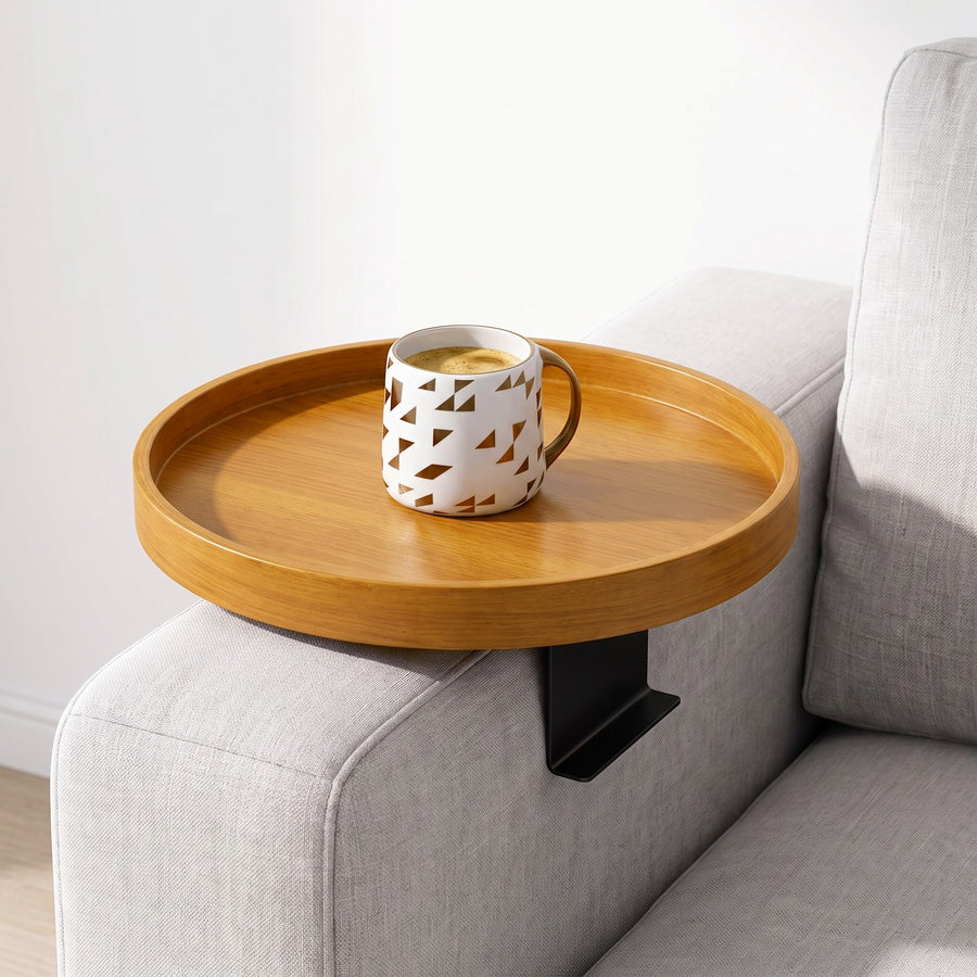 Golden Oak clip-on tray on a sofa arm with a mug of coffee