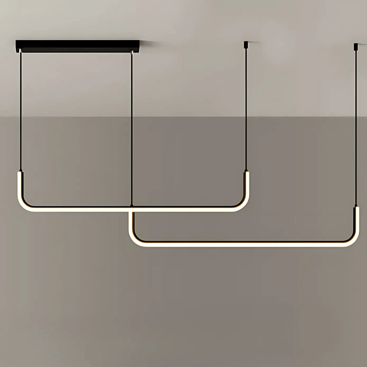 Black two bar Dumont linear pendant light on a gray wall