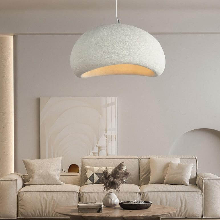 White Ginza pendant light above a cream sofa