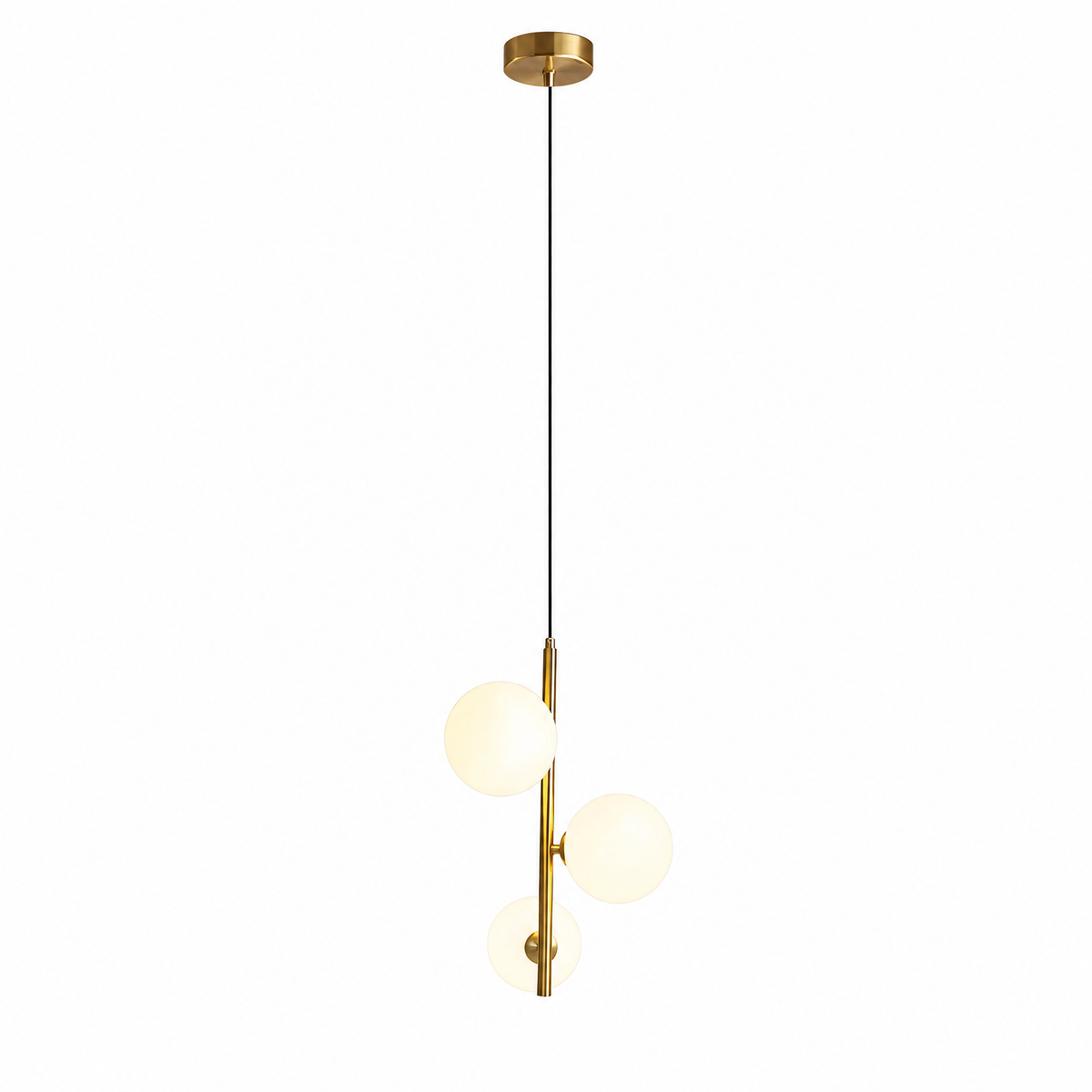 Brass Perla globe pendant light with three frosted opal glass globes glowing warm white