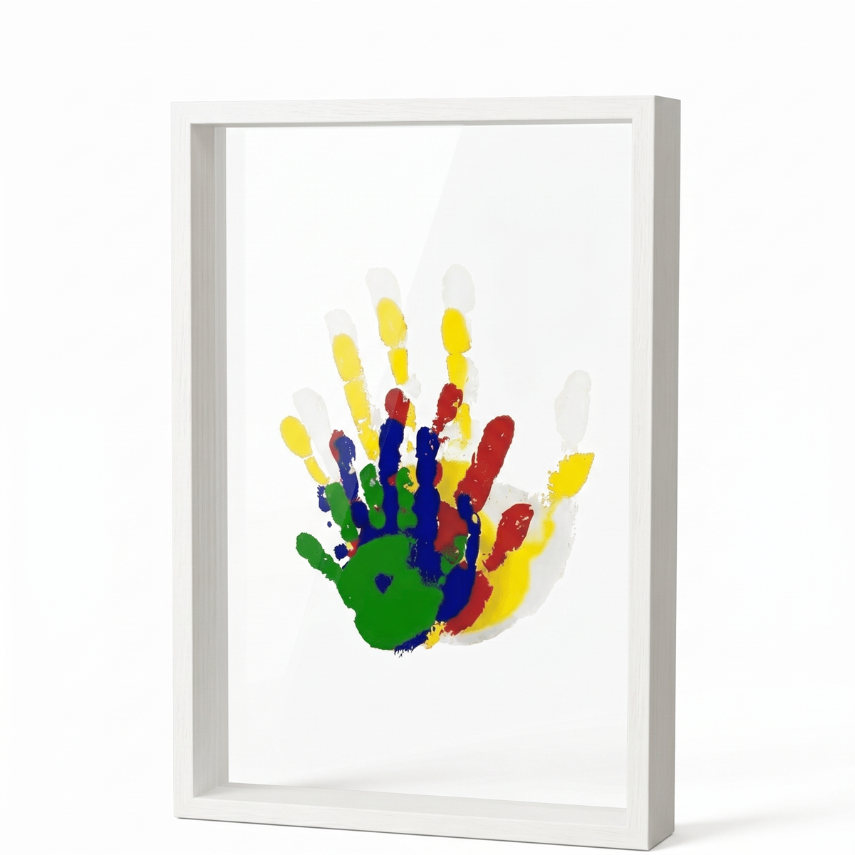 White baby footprint keepsake frame standing on a nursery shelf