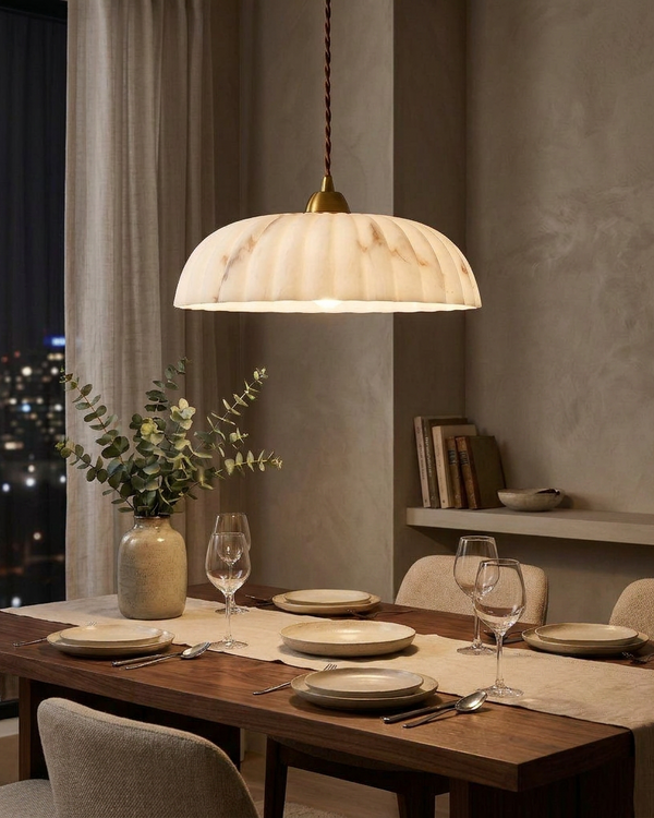 Orielle organic pendant light above a modern dining table