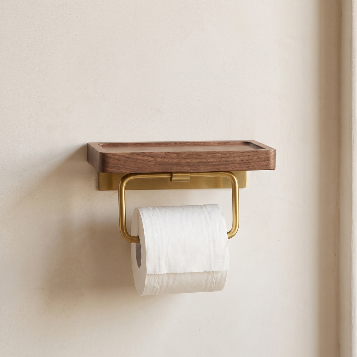 Single walnut toilet paper holder with a brass tone loop bar
