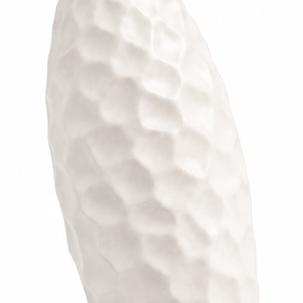 Vertically contoured ceramic surface shown close up