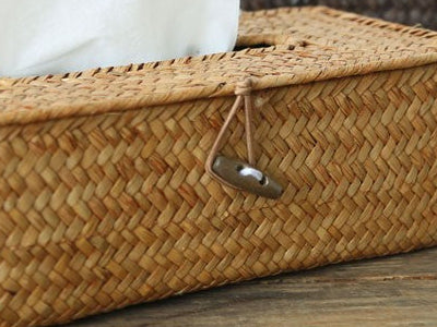 Close up of the herringbone rattan weave and the loop and toggle
