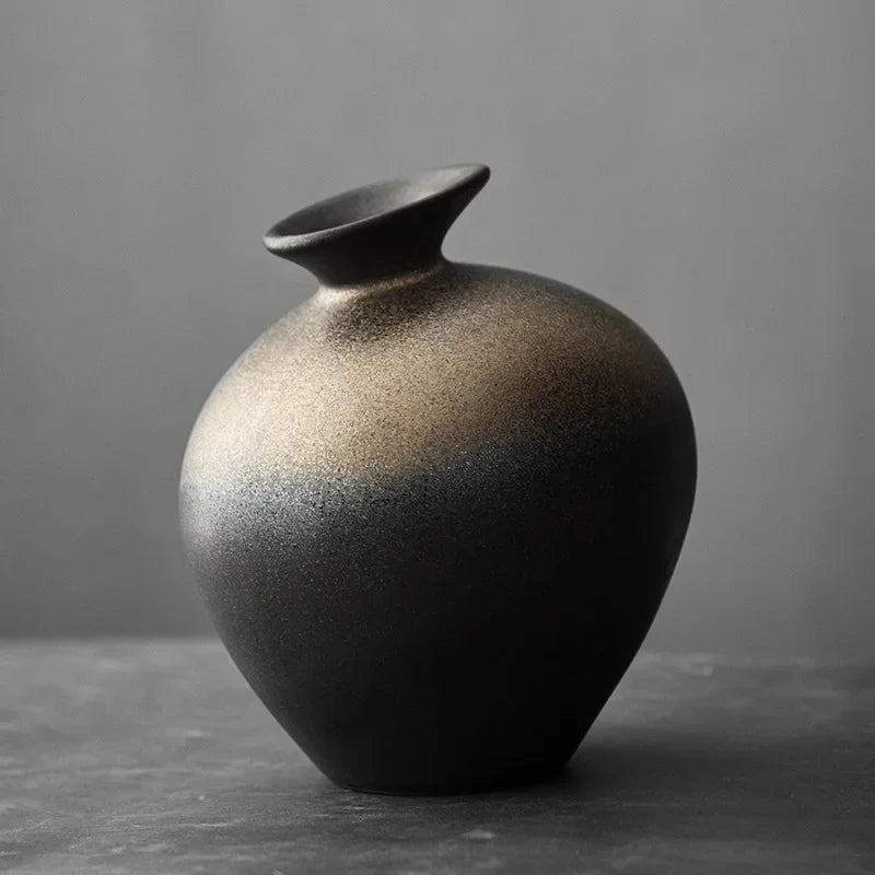 Matte black jar vase fading to a bronze glaze at the shoulder