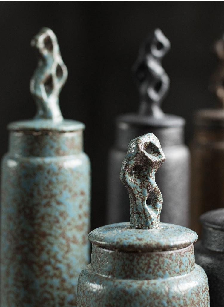 Handmade stoneware tea caddy with airtight ceramic lid top down view showing the opening