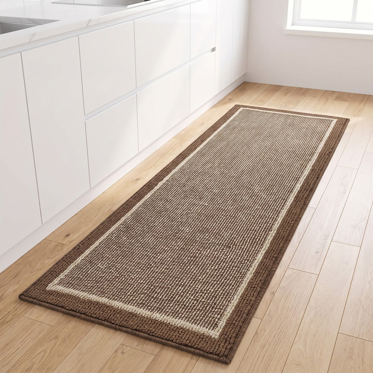 Strata washable kitchen runner rug in Mocha on a light wood kitchen floor