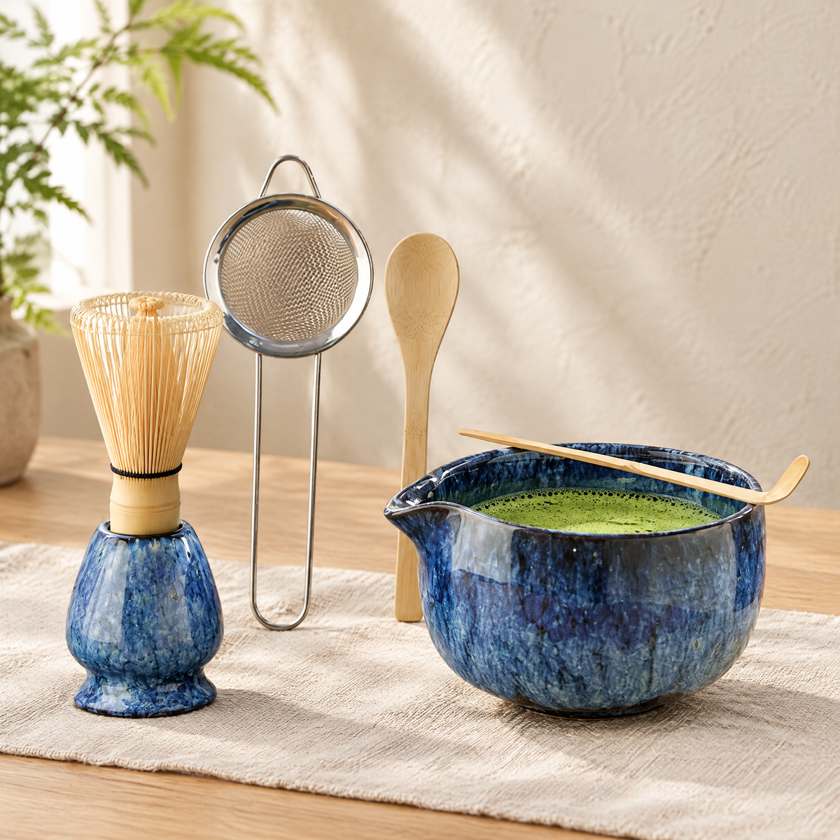Blue glaze matcha bowl and whisk holder with bamboo whisk, scoop and sieve